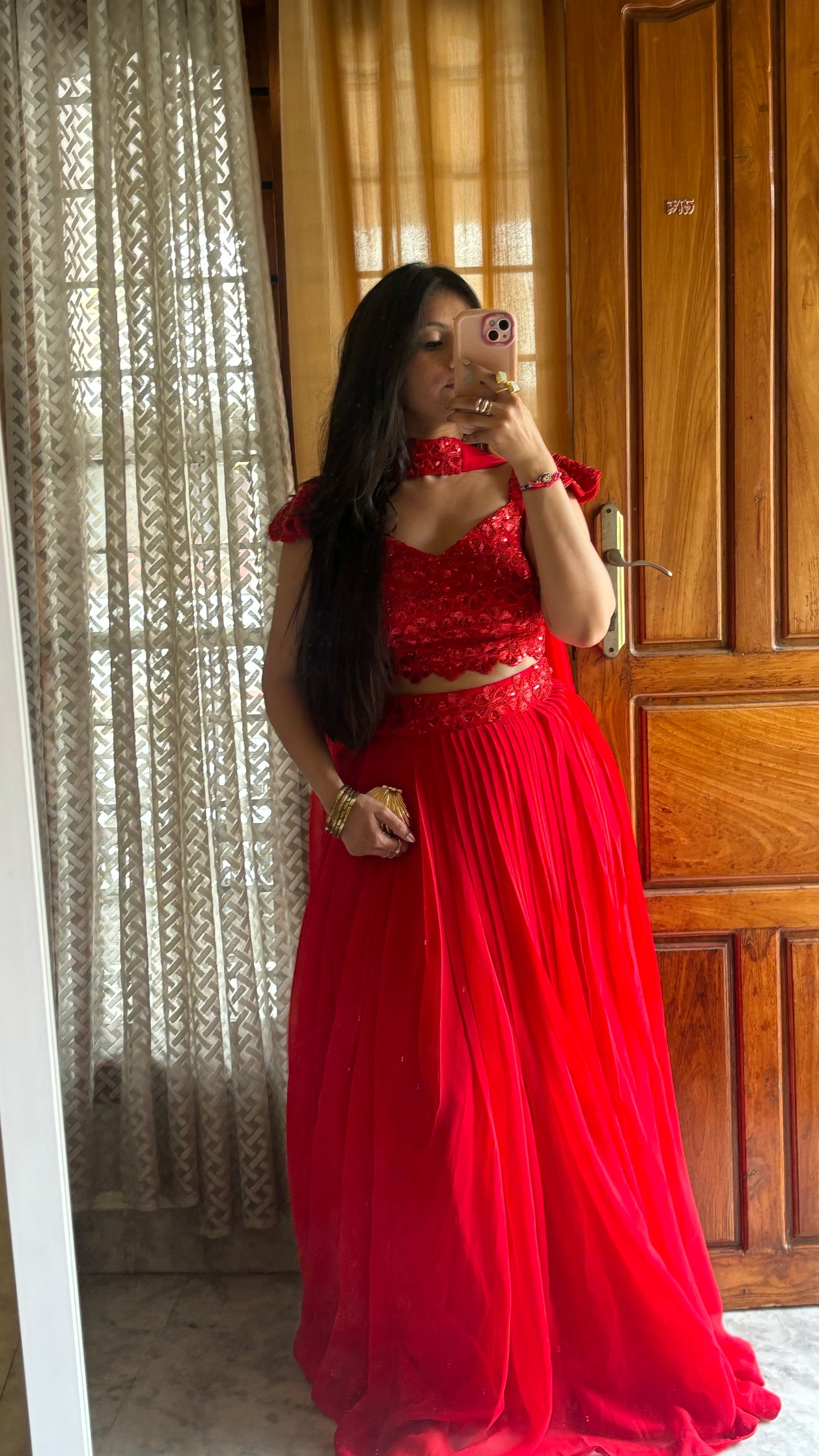Radiant Red Heavy Embellished Blouse & Pleated Georgette Lehenga