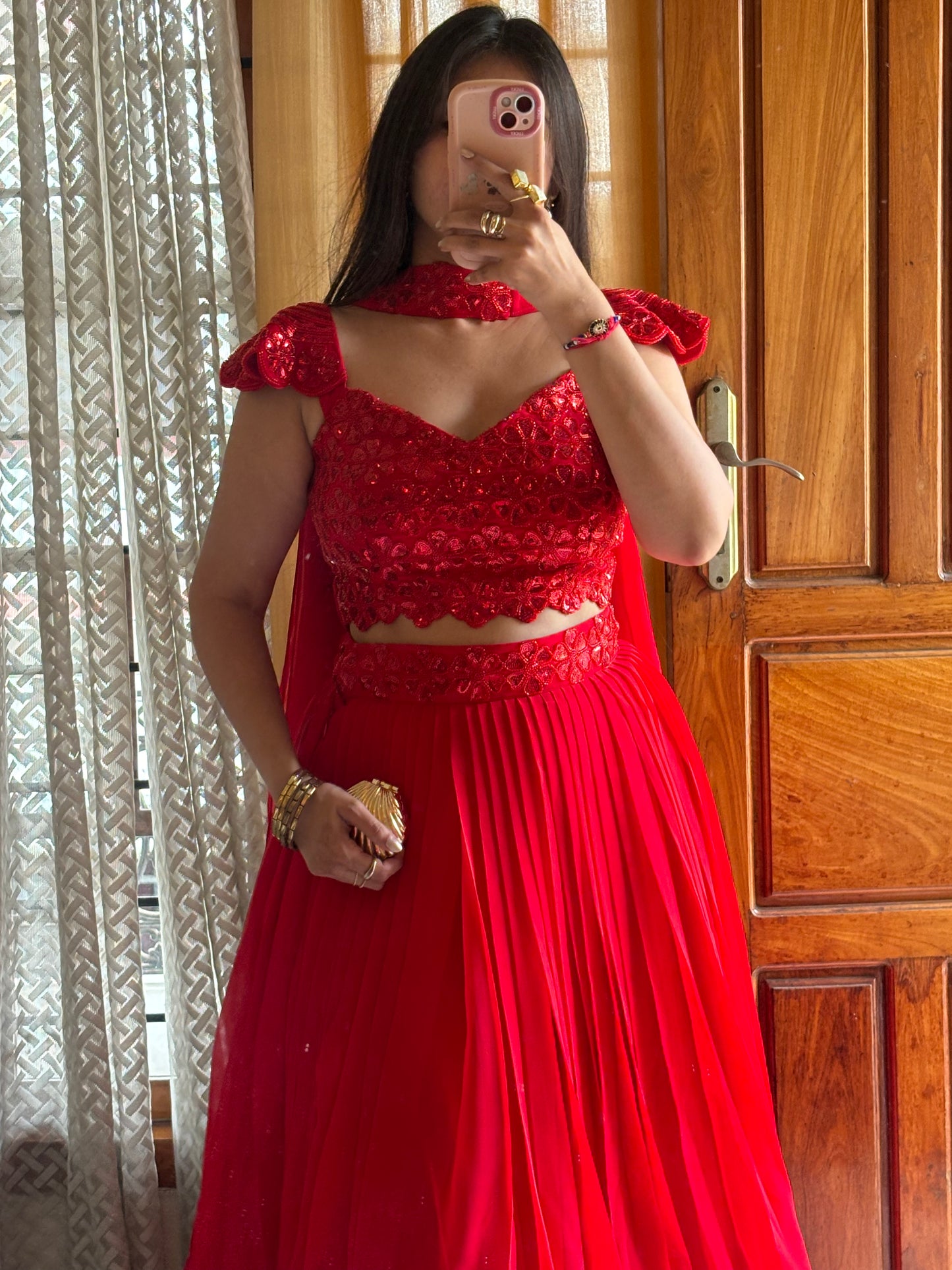 Radiant Red Heavy Embellished Blouse & Pleated Georgette Lehenga