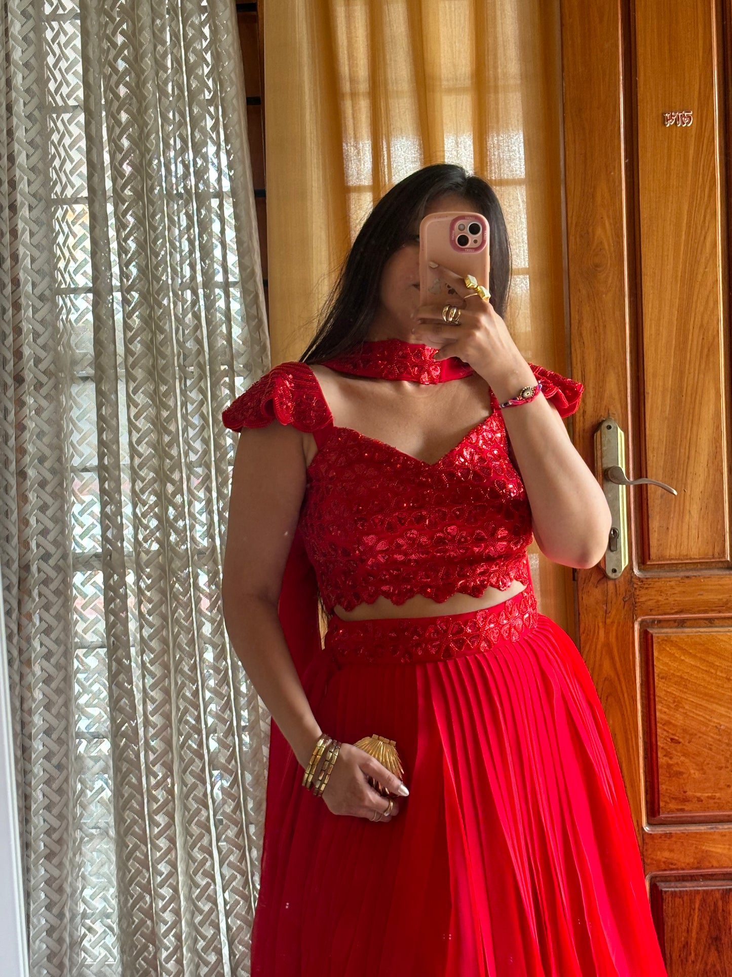 Radiant Red Heavy Embellished Blouse & Pleated Georgette Lehenga